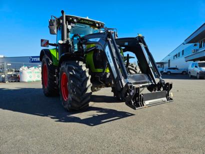 CLAAS ARION 550 Cebis Cmatic -traktori etukuormaajalla