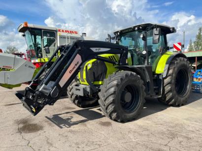 CLAAS ARION 660 Cmatic Cebis -traktori etukuormaajalla