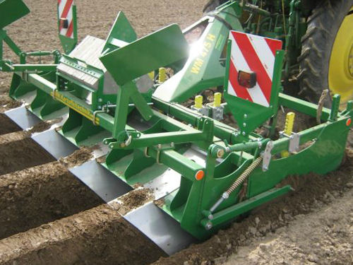 WM Kartoffeltechnik penkinmuotoilija