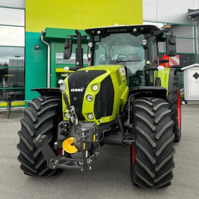 CLAAS ARION 660 Cebis Cmatic -traktori etunostolaitteella