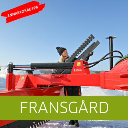 Fransgård talvimaisemassa, taustalla nainen